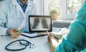 Doctor and patient discussing chest x-ray