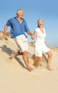 Senior couple enjoying the beach