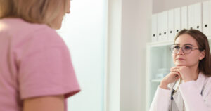 Attentive-Doctor-Listening-to-female-patient