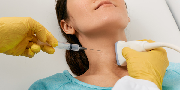 Close-up-Of-Doctor-Hands-Holding-needle-ultrasound