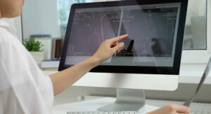 doctor examining MRI Images on Monitor