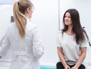 woman speaking with MRI technician