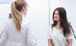woman speaking with MRI technician