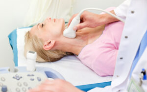 female patient carotid ultrasound