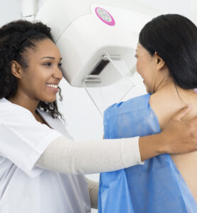 woman getting a mammogram